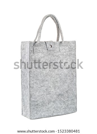 Environmental bag made of felt-isolated on white background Royalty-Free Stock Photo #1523380481