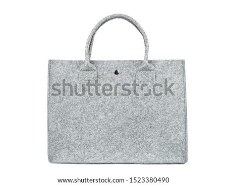 Felt shopping bag isolated on white background Royalty-Free Stock Photo #1523380490