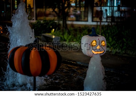 Fancy pumpkin dolls with bright lights, popular for decorating during the Halloween season.