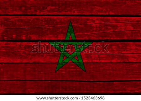 photo of the beautiful colored national flag of the state of Morocco, concept of tourism, economics and politics, closeup