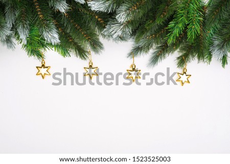 Christmas composition. Christmas present, New Year's toys, gifts, fir branches on a white background. Flat lay, top view, copy space
