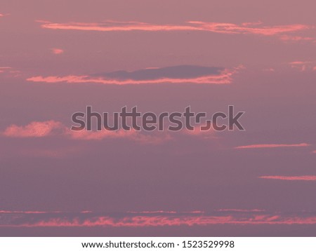 Violet clouds formation at sun set seen from european city of Bielsko-Biala in Poland in 2018 warm summer day at evening in July.