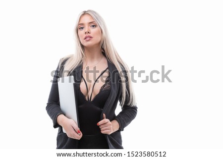Beautiful business lady holding laptop on white background