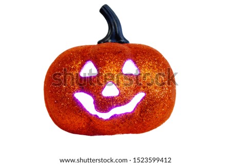 Halloween shiny isolated pumpkin on a white background with evil eyes and mouth cut out