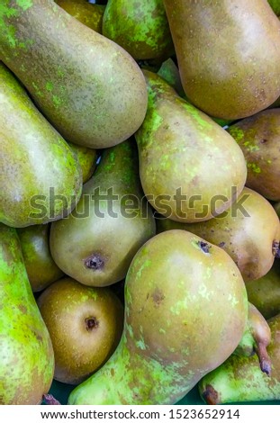 fresh pear on store shelves. Selective focus. Blur background