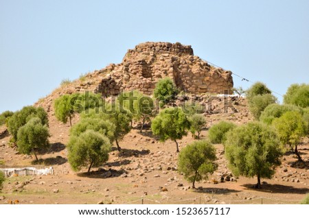 Nuraghe Sirai : archaeological site located in the Sulcis, historical region of south-western Sardinia Royalty-Free Stock Photo #1523657117