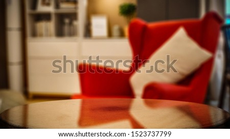 Wooden table background of free space for your product. Blurred fall home interior background. 