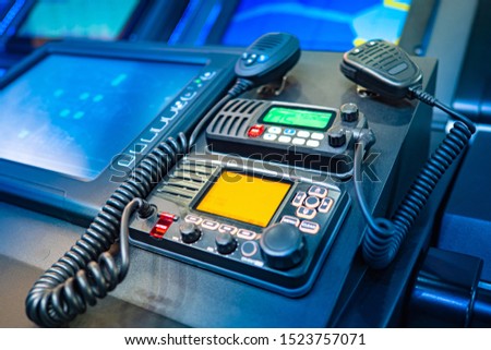 Remote control and receive information on the captain bridge. Ship intercom. The system of transmission of orders of the captain of the ship. Royalty-Free Stock Photo #1523757071