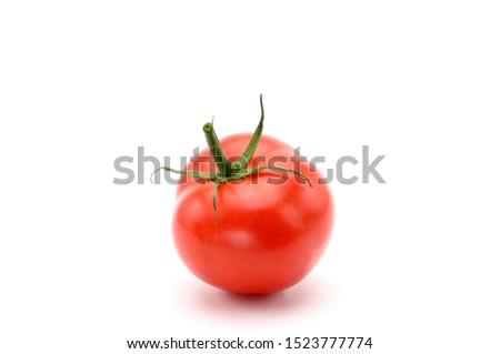 Red tomatoes on an isolated white background