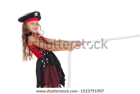 Close-up picture of a pirate girl pulling the rope