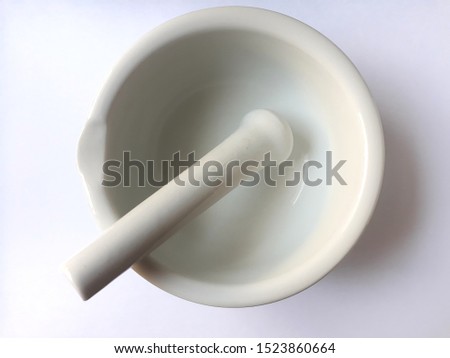 Mortar and pestle are implements used since ancient times to prepare ingredients or substances by crushing and grinding them into a fine paste or powder in the kitchen, medicine and pharmacy.