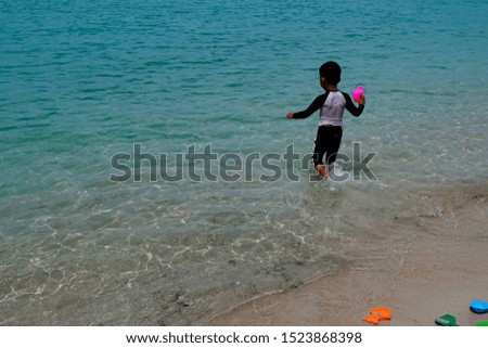 Weekends, children playing in the sea, outdoor places, holidays