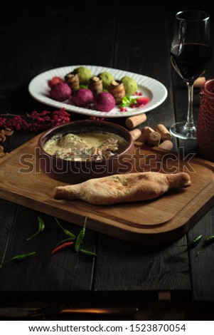 Sicivi and appetizer balls of vegetables on a dark wooden background. catering menu