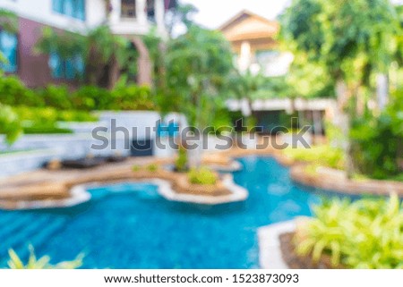 Abstract blur and defocus beautiful outdoor swimming pool in hotel resort for leisure relax in vacation