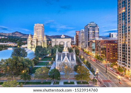 Salt Lake City, Utah, USA downtown cityscape over Temple Square at dusk.