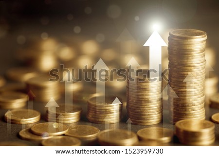 Stack of Gold Coin  with Arrow visual graphic. Fussiness Concept : Market uptrend. COPY SPACE.