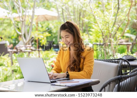 Business Asian young woman working with computer laptop and thinking to get ideas and requirement in Business startup feeling so happiness,Small Business Startup Concept