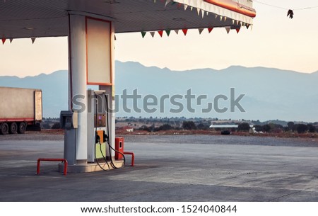 Fuel gas station and pump at dawn