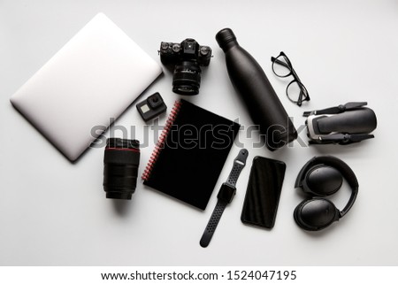 Flat Lay Shot Of Techno Items For Traveller With Smartwatch Mobile Phone And Wireless Headphones