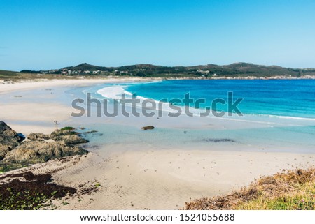 View of Santa Comba beach on the Spanish Atlantic coast in summer time