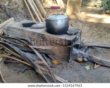 Traditional Stove From Indonesia With Wood And Fire - Image 