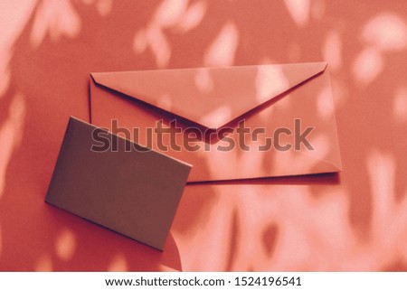 Holiday marketing, business kit and email newsletter concept - Beauty brand identity as flatlay mockup design, business card and letter for online luxury branding on orange shadow background
