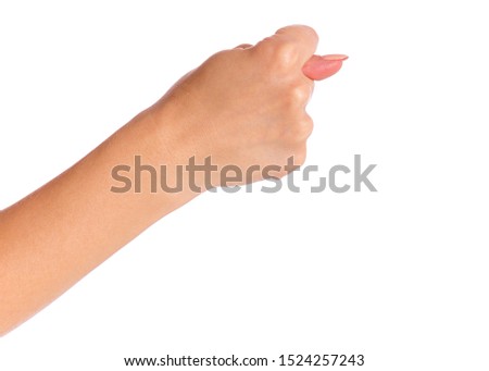 Female hand shows fig gesture, isolated on white background. Beautiful hand of woman with copy space.