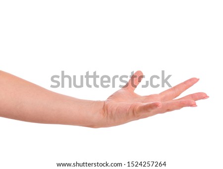 Female empty hand holding something - palm up, isolated on white background. Beautiful hand of woman with copy space.
