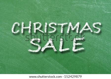Christmas Sale handwritten with white chalk