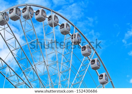 Ferris Wheel On Sky Background. High quality stock photo.