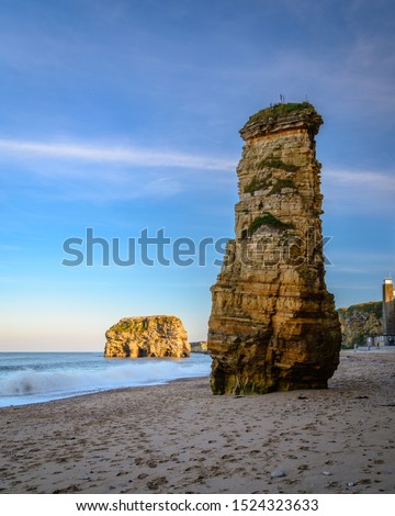 Weathered Sea Stacks at Marsden Bay, located near South Shields, consisting of a sandy beach enclosed by Magnesian Limestone Cliffs and sea stacks