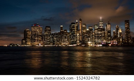 Skyline of New York City at night with impressive sky