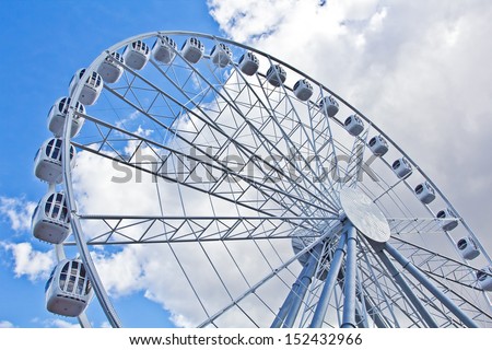 Ferris Wheel On Sky Background. High quality stock photo.