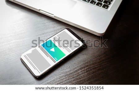 Native Advertising and Programmatic targeting digital marketing - Cross-device and multi target ads strategy. Mobile smart phone with advertising effect on the screen. Royalty-Free Stock Photo #1524351854