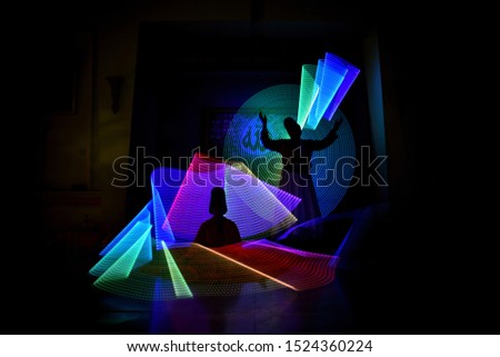 whirling Sufi dance in silhouette Royalty-Free Stock Photo #1524360224