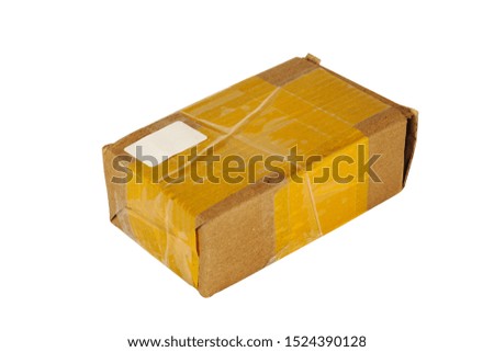Closed cardboard box, rewound with adhesive tape, with a place for signature on a white background.
