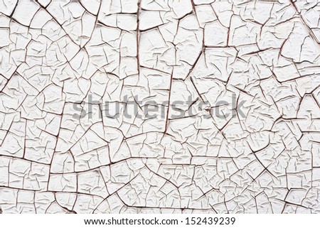 Close up white color cracked paint texture background