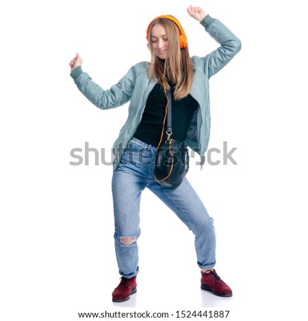 Woman in jeans and coat jeans holding black bag smiling standing happiness on white background isolation