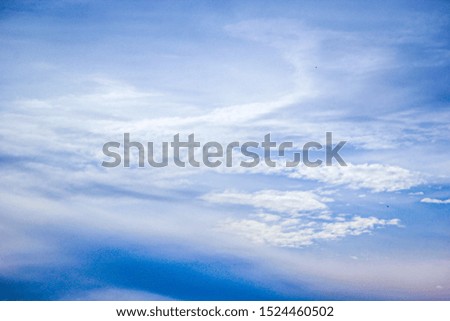 Fluffy white clouds in the sky background