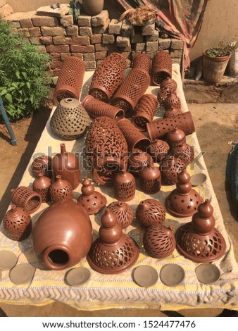 Beautiful clay Vases and clay cooking pots these all are. Handmade in India by Traditional Potters.