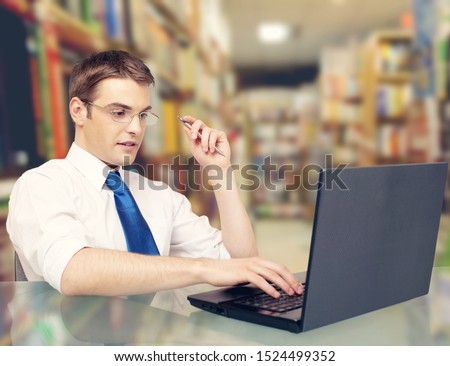 Frustrated black male student work at laptop get mad having device software operational problems, angry african American guy man feel confused with slow internet connection on computer or virus attack Royalty-Free Stock Photo #1524499352