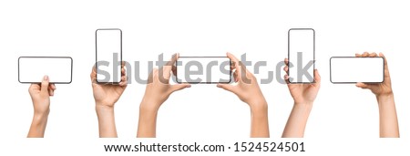 Set of female hands holding smartphone with blank screen in different orientation isolated on white background, panorama Royalty-Free Stock Photo #1524524501