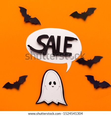 October sales. Halloween ghost and speech bubble with text on orange background