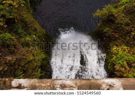 View from the bridge of the second section of Multnomah Waterfall located at Multnomah Creek in the Columbia River Gorge, Oregon, USA Royalty-Free Stock Photo #1524549560