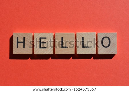 Hello in 3d wooden alphabet letters isolated on a plain background