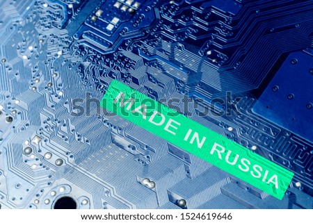 close-up. motherboard in blue. the inscription is made in Russia