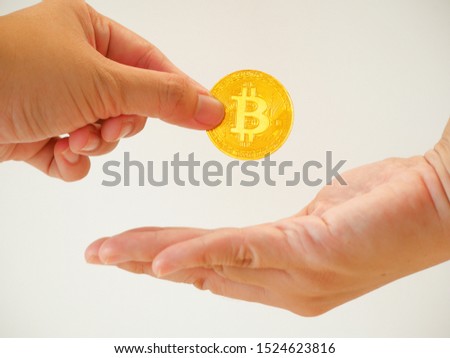 Businesswoman give bitcoin in the white background 