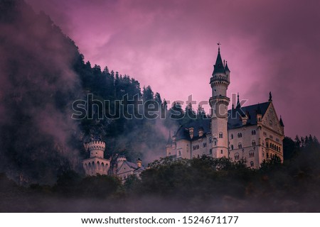 View of Neuschwanstein castle in the sunset. Germany