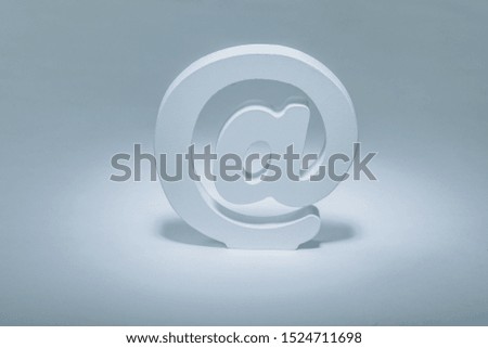 close up view email symbol on dark white background