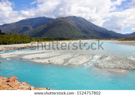 river of melted glacial water, West coast of New Zealand, south island